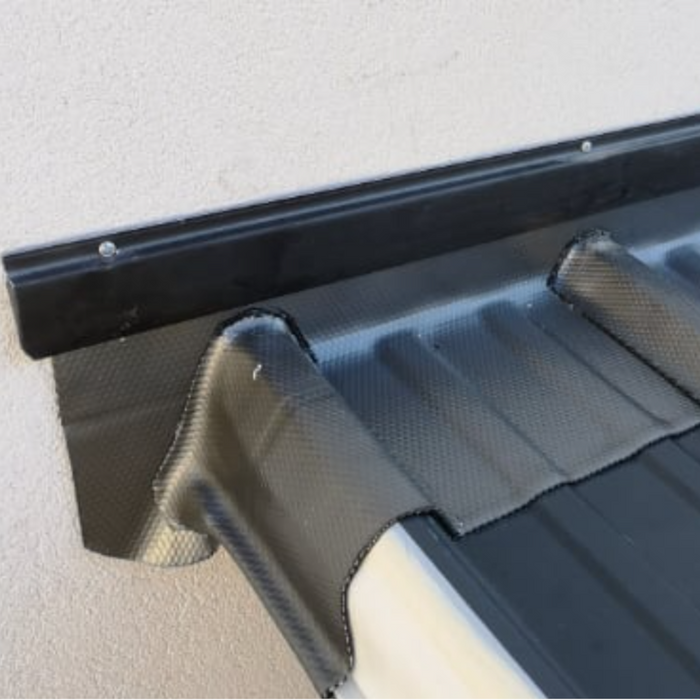 An image of Leadax fitted as flashing on the side of a house in challenging positions.