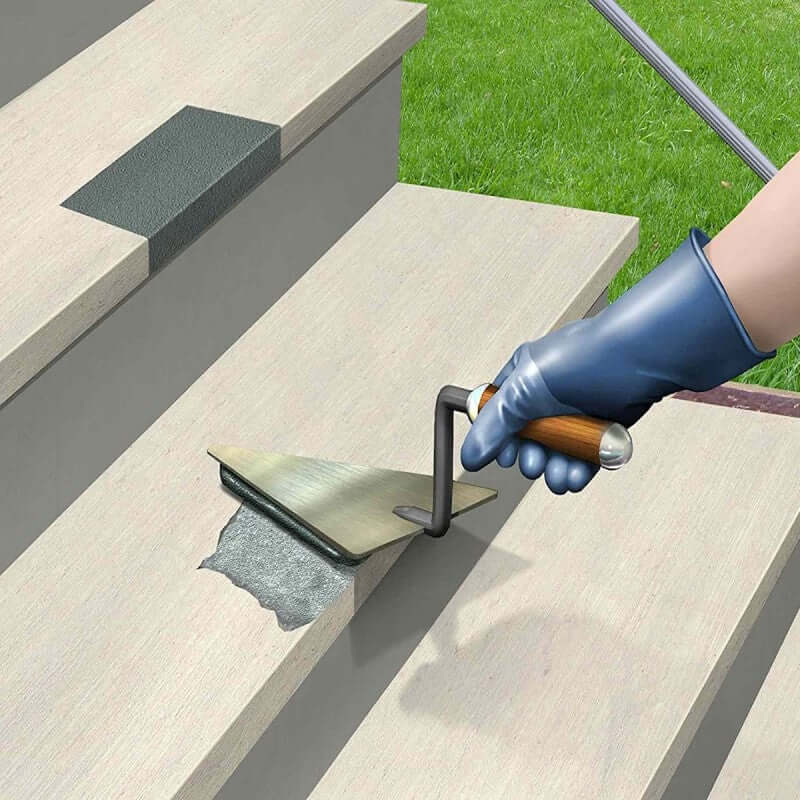 An image of Feb Febond SBR Waterproofer & Bonding Admixture being applied to steps with a trowel.