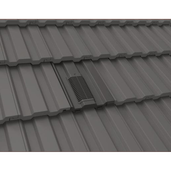 An image of Manthorpe Mini Castellated Tile Vent in Slate grey on a roof to show the finish.