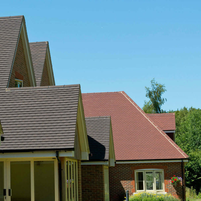 An image of a roof fitted with Marley Concrete Plain Tiles to show what they look like.