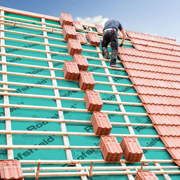 An image of proctor roof shield breather membrane on a roof under roofing tiles to show where this is applied.